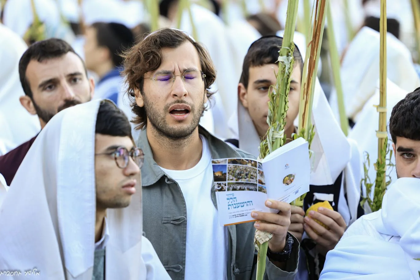 Singing together at a Sukkot gathering
